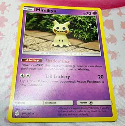 Pokemon TCG Mimikyu 97/236 Cosmic Eclipse Holo Rare Pokemon EN 2019 70HP - Image 1