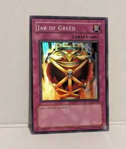 Yu-Gi-Oh! Jar Of Greed LON-047 Super Rare Unlimited Holo Trap Card NM - Image 1