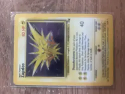 Team Rockets Zapdos 15/62 Fossil Set Rare Holo Pokemon Card TCG - Image 1