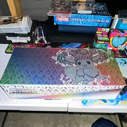 Pokemon Prismatic Evolutions Eevee Deck Case 65ct Standard Size Cardboard - Image 1