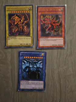 Yu-Gi-Oh! TCG Set of Egyptian God Cards (Obelisk, Ra, Slifer) LOC1 - Image 1