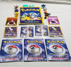 Large Pokemon lot inc 4 sealed First Movie Promo cards + 3 vintage rule books - Image 1