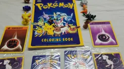 Large Pokemon lot inc 4 sealed First Movie Promo cards + 3 vintage rule books - Image 2