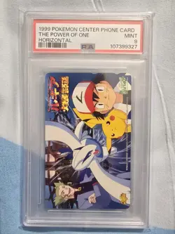 1999 Pokemon The Power Of One Horizontal Pokemon Center Phone Card PSA 9 - Image 1