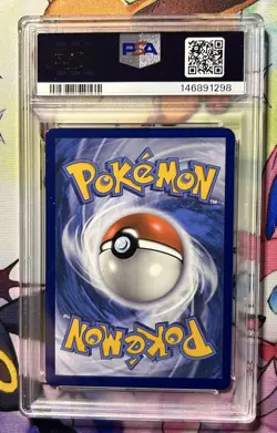 2025 POKEMON DESTINED RIVALS POKEMON CENTER ETB TEAM ROCKET'S WOBBUFFET PSA 9 - Image 2