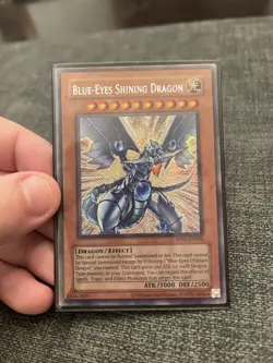 Yu-Gi-Oh! Blue-Eyes Shining Dragon RP02-EN096 Mint Secret Rare Foil Bleed - Image 1
