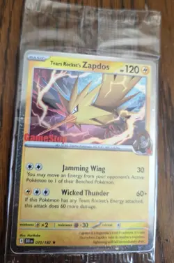Team Rocket’s Zapdos Pokemon Promo Card - GameStop Exclusive - Holo Rare SEALED! - Image 1
