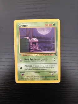 Grimer 48/62 Fossil Regular Pokemon Card English 1999 WOTC - Image 1
