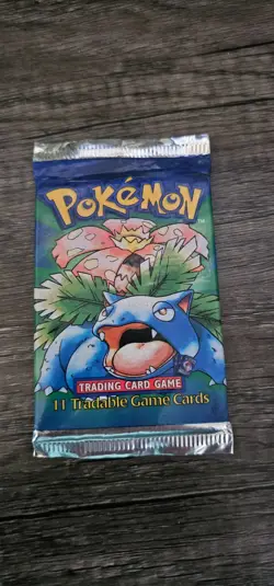 Rare 1999 Pokemon Base Set Booster Pack with Shadowless pack indicators - Image 1
