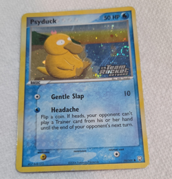 Pokemon TCG Psyduck 70/109 Team Rocket Returns Holo Swirl, Scratches On Front - Image 1
