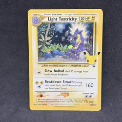Pokemon TCG Light Toxtricity SWSH137 English Holo Card Celebrations Rare LP - Image 1