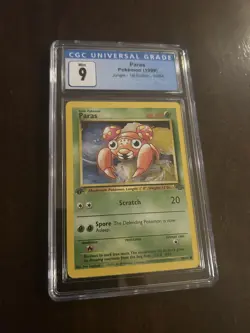 1999 Pokemon Jungle 1st Edition #59 - Paras CGC 9 Mint - Image 1