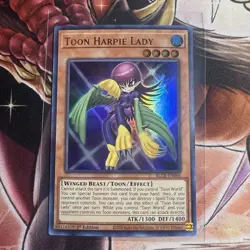 *** TOON HARPIE LADY *** 1ST EDITION HOLOGRAPHIC ULTRA RARE BLCR-EN066 YUGIOH! - Image 1
