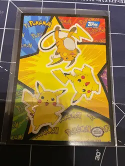 1999 Topps Pokemon the First Movie Puzzle Pikachu & Raichu Blue Logo - Image 1