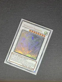 Yugioh Stardust Dragon - Unlimted Ghost Rare (TDGS-EN040) MP/LP - Image 1