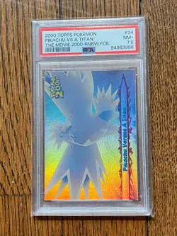 Topps Pokemon | The Movie 2000 | Rainbow Holo Foil | Pikachu Vs a Titan | PSA7.5 - Image 1