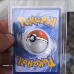 The Pokemon Company Reshiram & Charizard GX SM247 TAG TEAM Promo Full Art Holo - Image 2