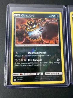 Pokemon TCG Card Lot - Guzzlord Holo And Reverse Holo Rare - Cosmic Eclipse 2019 - Image 1
