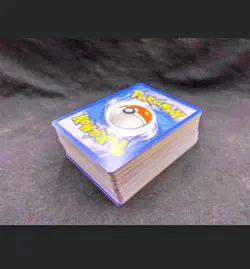 Pokemon TCG 50-Card Lot C/Uc/R/Holo/Reverse Holo + Mini Binder NM NO DUPES! - Image 1