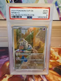 2024 POKEMON PALDEAN FATES POKEMON CENTER ETB PROMO #075 MIMIKYU PSA 9 - Image 1