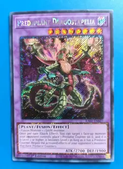 Near Mint Yugioh Predaplant Dragostapelia - RA01-EN027 - Platinum Secret Rare - Image 1