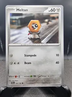 Meltan - 102/142 - Stellar Crown - Pokemon Card - Mint/NM - Image 1