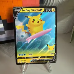 NM Pokemon Surfing Pikachu V 008/025 Celebrations Holo - Image 1