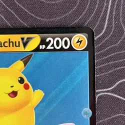 NM Pokemon Surfing Pikachu V 008/025 Celebrations Holo - Image 4