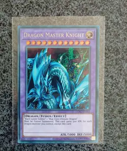 Yugioh - Dragon Master Knight *Secret Rare* LCKC-EN065 (NM) - Unlimited Edition - Image 1
