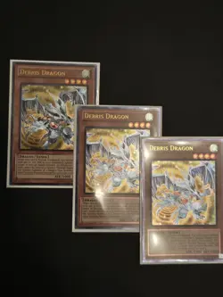 Yu-Gi-Oh! Debris Dragon AP01-EN002 Ultimate Rare Near Mint - Image 1