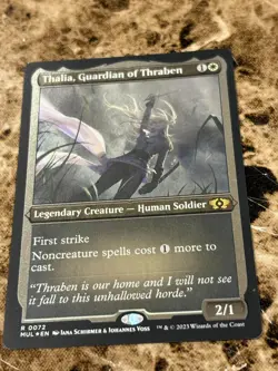 THALIA, GUARDIAN OF THRABEN Magic MTG March of the Machine Etched Foil - Image 1