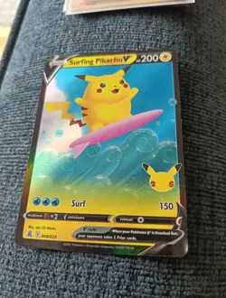 Pokemon Card Surfing Pikachu V 008/025 Celebrations Near Mint - Image 1
