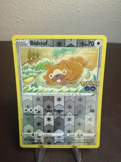 Bidoof (Peelable Ditto) 059/078 Holo Common Pokemon GO Pokemon Reverse Holo LP - Image 1