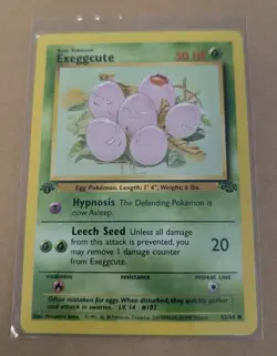 1995 POKEMON EXEGGCUTE 52/64 JUNGLE 1ST EDITION PRE OWNED USED CARD - Image 1