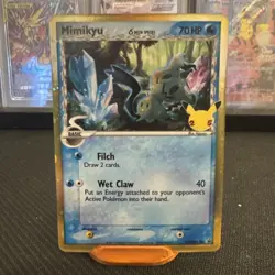 Mimikyu - SWSH136 - Black Star Holo - Celebrations (Delta Species) - NM/N - Image 1