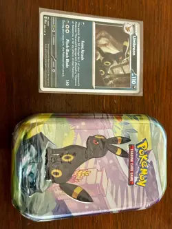 Pokemon TCG Scarlet and Violet Prismatic Evolutions Mini Tins - Image 1