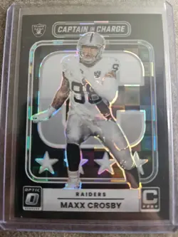 2025 Panini Donruss Optic - Captain in Charge Maxx Crosby #4 Black Pandora Prizm - Image 1