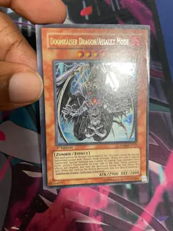 YUGIOH - DOOMKAISER DRAGON/ASSAULT MODE - ULTRA RARE - 1ST ED - LP - CRMS - Image 1