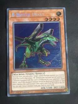 YUGIOH Secret Rare B-Buster Drake LCKC-EN020 1st Edition - Image 1