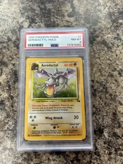 1999 Pokemon TCG Fossil Aerodactyl Holo Rare Card PSA 8 NM-MT - Image 1