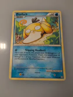 Psyduck 74/102 Triumphant Naoki Saito Art Pokemon TCG Card LP/NM - Image 1