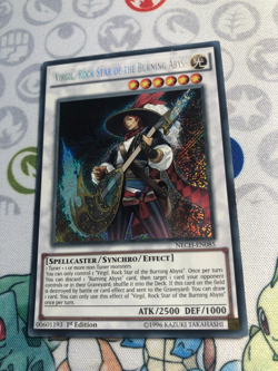 Virgil, Rockstar of the Burning Abyss NECH-EN085 Secret Rare 1st Edition Yugioh - Image 1