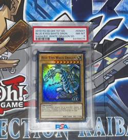 2013 Yu-Gi-Oh Blue-Eyes White Dragon SDBE-EN001 PSA 8 - Image 1