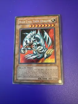 Yu-Gi-Oh TCG Blue-Eyes Toon Dragon MRL-000 Unlimited Secret Rare Card - Image 1