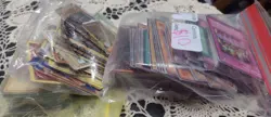Yu-Gi-Oh and Pokemon Bulk Bag! Includes Coins and Pin - Image 1