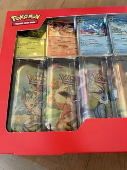 Pokemon Prismatic Evolutions 8 Mini-Tins with Promo Cards - Image 2