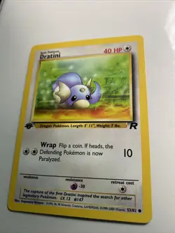 1st Edition Dratini - Vintage WotC 53/82 Team Rocket Pokemon Card - Image 1