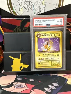 1997 POKEMON JPN ROCKET #135 DARK JOLTEON PSA 8 - Image 1