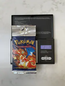 21.14g Pokemon Base Set Charizard Hanger Booster Pack | WOTC | 1999 - Image 1