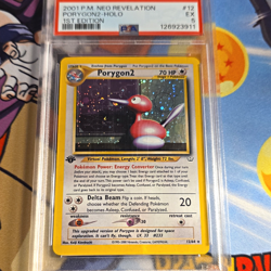 The Pokemon Company Neo Revelation Porygon2 12/64 1st Edition Holo PSA 5 - Image 1